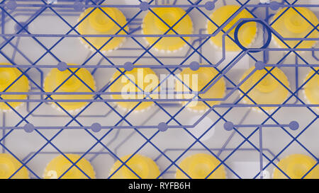 Round silicone switches and PCB on plastic membrane. Disassembled computer keyboard. Abstract technical background. Yellow rubber pushbuttons. Texture. Stock Photo
