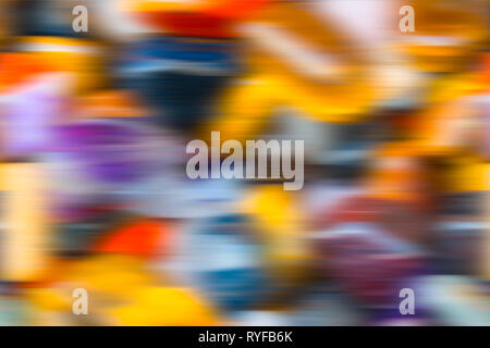 Abstract decorative colorful blurred background. Beautiful optimistic festive texture with rich colors, wavy dynamic motion and 3D sense. Celebrations. Stock Photo