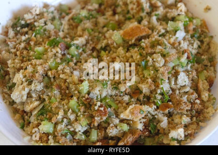 Close up of raw stuffing mixture for Thanksgiving turkey, a recipe of bread crumbs, celery, onion, parsley, sage and butter  Close up, raw, stuffing,  Stock Photo