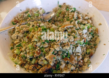 Close up of raw stuffing mixture for Thanksgiving turkey, a recipe of bread crumbs, celery, onion, parsley, sage and butter Stock Photo