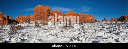 Windows Sections after a snow storm, Arches National Park, Utah Stock Photo