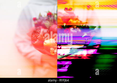 Image of a beautiful bouquet in the hands of a woman with computer damage or glitches Stock Photo