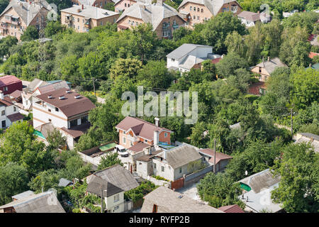 Aerial top view of Kiev suburb houses from above, residential district in capital of Ukraine. Stock Photo