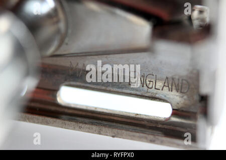Made in england carved on vintage gillette razor shaver, isolated on a white background, close-up Stock Photo