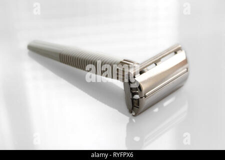 Vintage 60s-70s Gillette razor shaver, isolated on a white background, close-up Stock Photo