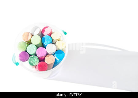 Pack of Jumbo Sidewalk Chalk, Assorted Colors in a Plastic Bucket on White Background with Shadow. Top View. Stock Photo