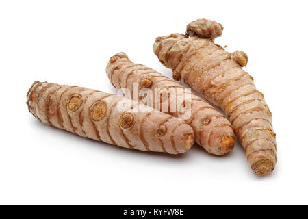 Fresh whole turmeric roots isolated on white background Stock Photo
