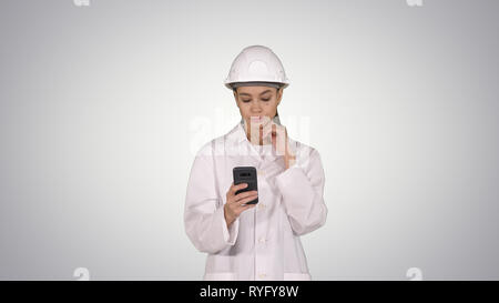 Scientist Using Phone Texting Message on gradient background. Stock Photo