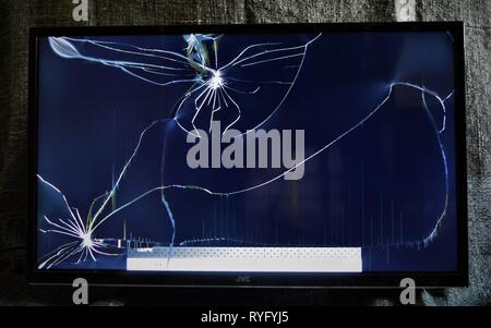 Broken lcd tv screen cracked cool abstract pattern. Stock Photo