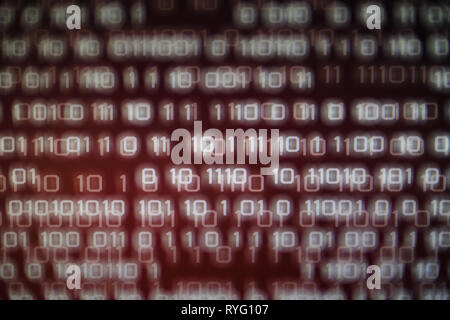 error message in computer data matrix. red binary background. hacker and internet computer problem concepts. danger and security failure power of inte Stock Photo