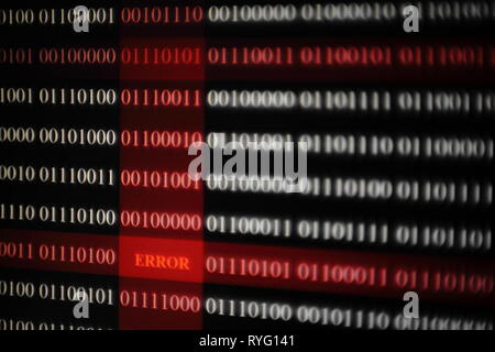 error message in computer data matrix. binary code on black and red background. hacker and internet computer problem concepts. danger and security fai Stock Photo