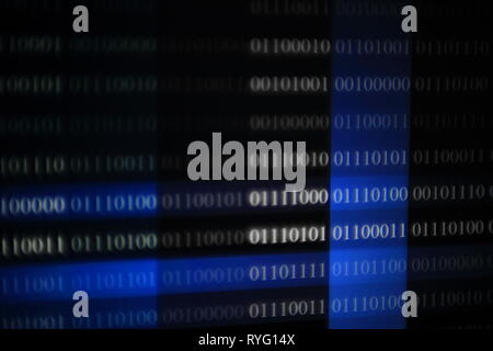 multiple layers matrix of binary code on blue space background. column of white light matrix floating in space. Stock Photo