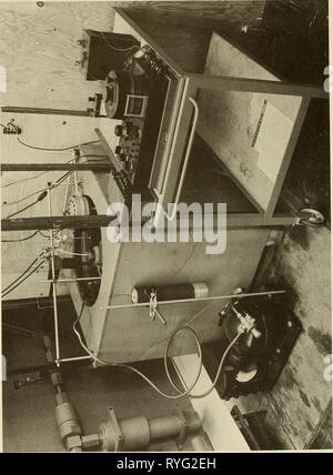 The effect of pressure on the electrical conductivity of sea water  effectofpressure00horn Year: 1962    FIGURE 3 THERMOSTATIC BATH Showing cooling unit and thermocouple potentiometer. Stock Photo