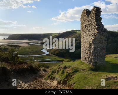 Pennard castle ruins overlooking Three Cliffs Bays and meandering Pennard Pill stream, Parkmill, The Gower peninsula, Wales, UK, October 2018. Stock Photo