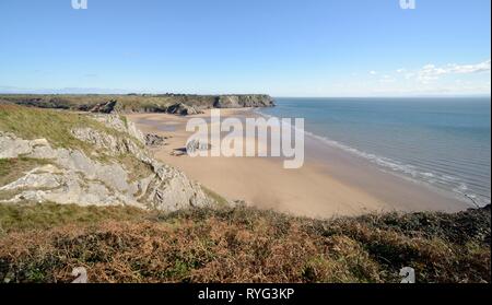 Overview of Three Cliffs Bay looking east from the Great Tor towards Pobbles beach, Penmaen, The Gower peninsula, Wales, UK, October. Stock Photo