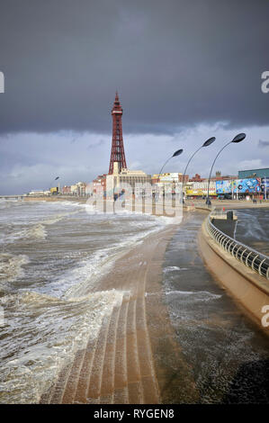 Storm clouds gather over the tower and the seafront in the seaside town of Blackpool Stock Photo