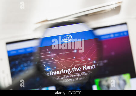 California, USA - 7 March 2019: Intel Corporation official website homepage under magnifying glass. Concept Intel Corporation, CPU logo visible Stock Photo