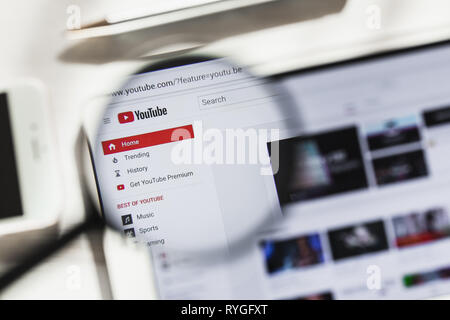 San Bruno, California, USA - 14 March 2019: YouTube Video hosting, social official website homepage under magnifying glass. Concept YouTube, social Stock Photo