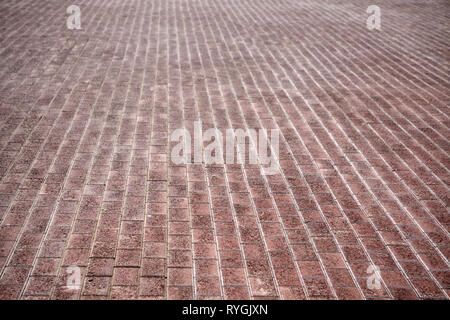 Red brick paving stones on a sidewalk Stock Photo