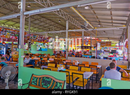 Restaurant terraces, along Moo 4, the main road, between pier and Sai Kaew Beach, Ko Samet, Thailand Stock Photo