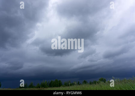 Dark sky and dramatic black cloud before rainy Stock Photo