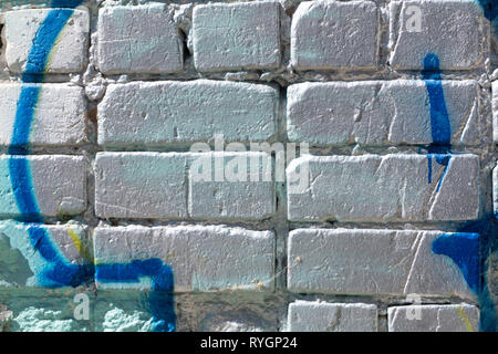Silver painted brick wall texture mortar orange Stock Photo