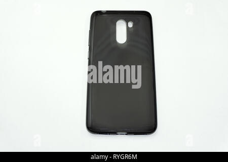 Smart phone on a gray background in a pink plastic case back view. Template of iphone 8 plus case Stock Photo