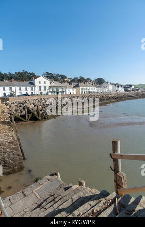 Instow, North Devon, England, UK. March 2019. Instow viewed from the harbour steps over the River Kerridge estuary. Stock Photo