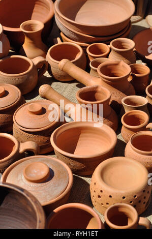 Lots of traditional ukrainian handmade clay pottery production, vertical composition Stock Photo