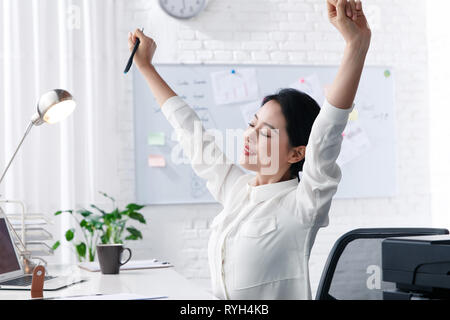 Young business woman yawn Stock Photo