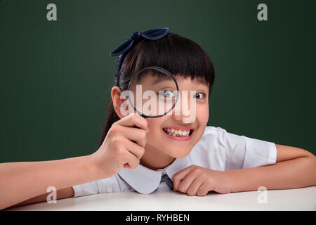 Primary school girl wears glasses Stock Photo