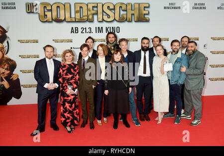 13 March 2019, Bavaria, München: The actor Axel Stein (l-r), the producer Justina Muesch, the actor Tom Schilling, the managing director Sony Pictures Entertainment Germany, Martin Bachmann, the actress Birgit Minichmayr, the producer Max Wiedemann, the actress Luisa Wöllisch, the actor Jan Henrik Stahlberg, the director and screenwriter Alireza Golafshan, the producer Quirin Berg, the actors Jella Haase, Klaas Heufer-Umlauf and Kida Khodr Ramadan come to the world premiere of the comedy 'The Goldfish' in the Mathäser cinema. The film will be released on 21.03.2018. Photo: Felix Hörhager/dpa Stock Photo