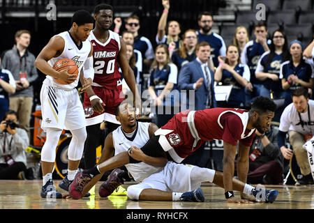 Brooklyn, New York, USA. 13th Mar, 2019. George Washington Colonials and Massachusetts Minutemen players collide during the second half at Barclays Center. Credit: Terrence Williams/ZUMA Wire/Alamy Live News Stock Photo