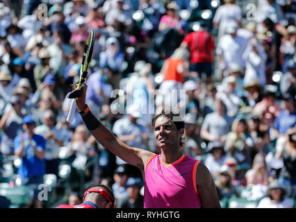 Indian Wells, USA. 13th Mar, 2019. Rafael Nadal of Spain celebrates after the men's singles fourth round match against Filip Krajinovic of Serbia at the BNP Paribas Open tennis tournament in Indian Wells, California, the United States, March 13, 2019. Nadal won 2-0. Credit: Zhao Hanrong/Xinhua/Alamy Live News Stock Photo