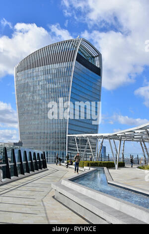 Roof terrace with water feature and skyline view. BreadTalk IHQ ...