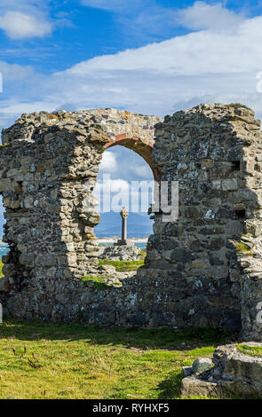 The ruins of the church of St Dwynwen on Llanddwyn Island off Newborough Warren and Beach, Angelsey, North Wales. Llanddwyn is a tidal island. Stock Photo