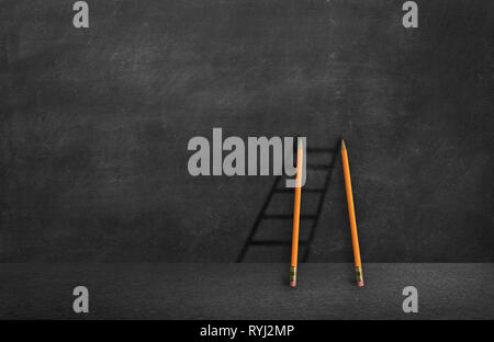 pencil staircase on chalkboard.climb to success concept Stock Photo