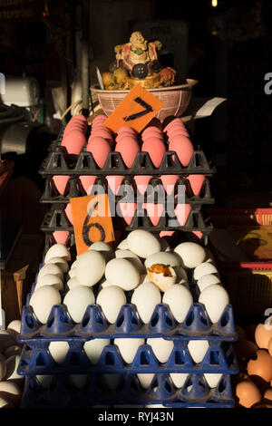 A variety of colored eggs for sale in a market in Khon Kaen, Thailand. Stock Photo