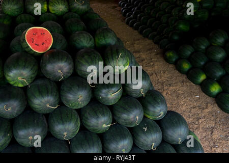 A fresh pile of watermelon is for sale at a wholesale market in Khon Kaen, Thailand Stock Photo