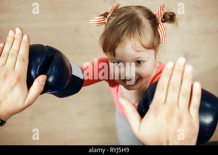 little girl is training boxing Stock Photo