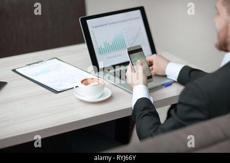 businessman working with new start up project using smart phone Stock Photo