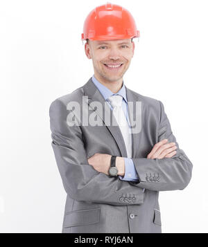 portrait of confident engineer in orange helmet. Stock Photo