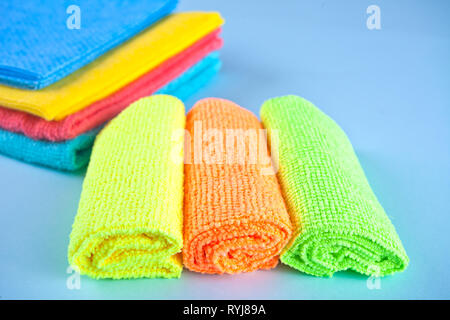 Set of Microfiber cleaning towels over blue background Stock Photo