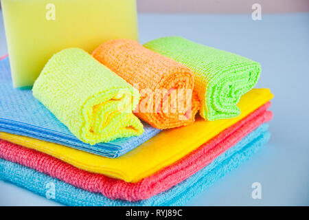 Set of Microfiber cleaning towels over blue background Stock Photo