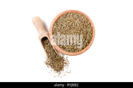 salvia or sage  in wooden bowl and scoop isolated on white background. top view. Spices and food ingredients. Stock Photo