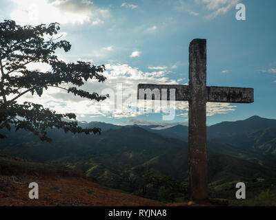 Cross and view over the Cauca valley in Colombia Stock Photo