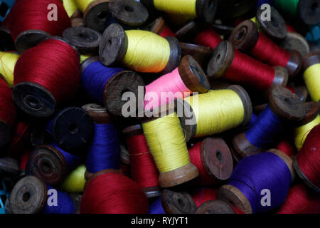 Close-up of multi-colored spools of thread.  Chau Doc. Vietnam. Stock Photo