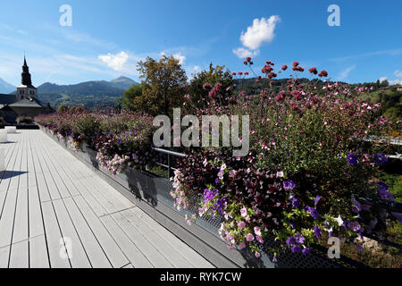 Colourful flowers in the  village of Saint Gervais les Bains in the French Alps.  France. Stock Photo