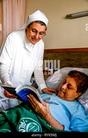 St Vincent de Paul hospital, run by the Daughters of Charity catholic missionaries in Nazareth, Israel. Geriatric ward. Stock Photo