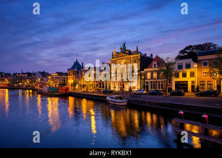 Canal and houses in the evening. Haarlem, Netherlands Stock Photo